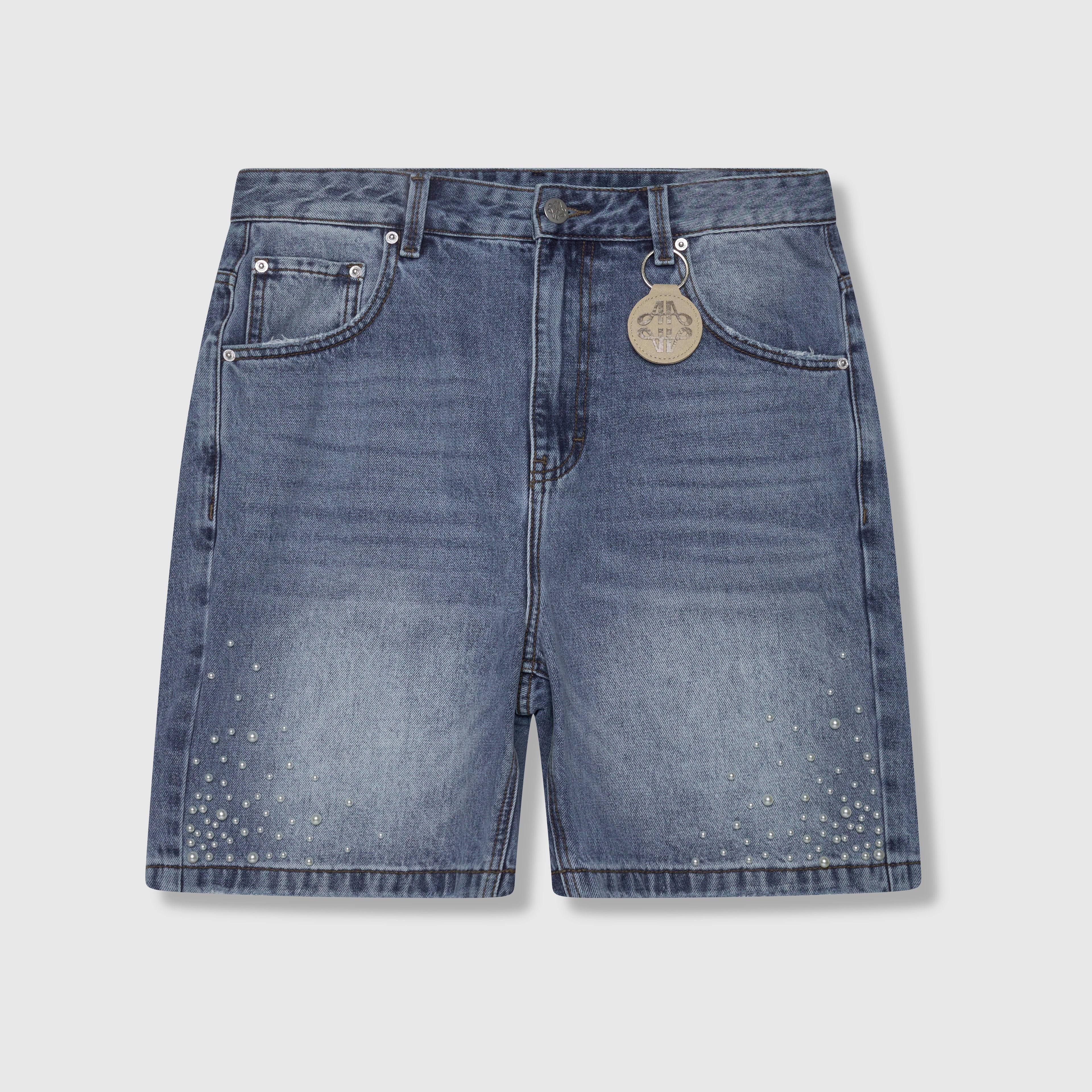 Shorts de mezclilla azul con perlas Akoya