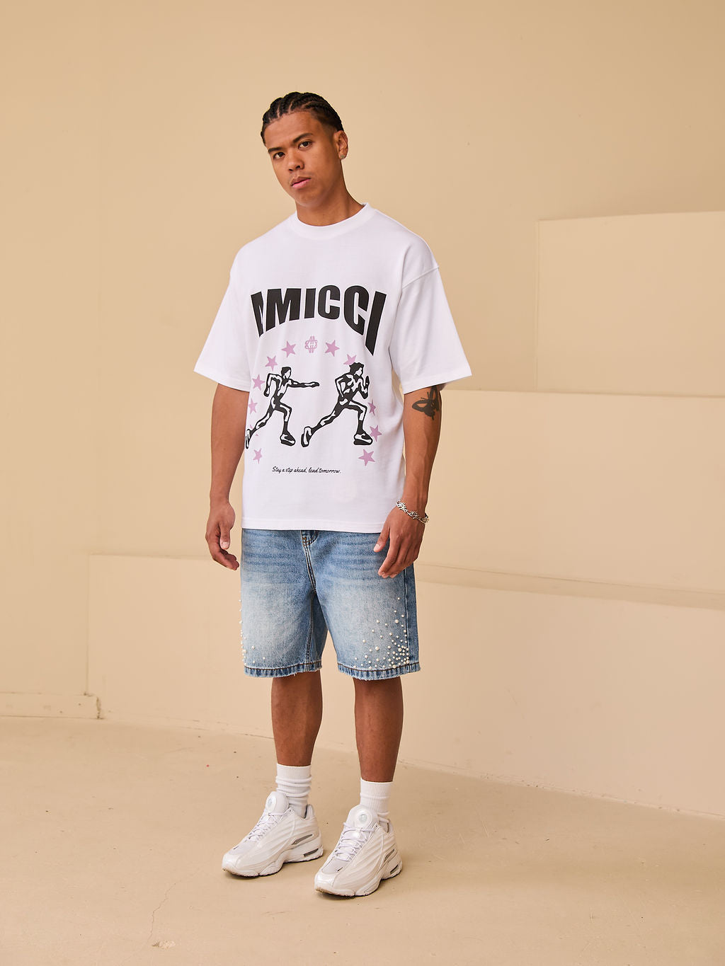 Shorts de mezclilla azul con perlas Akoya